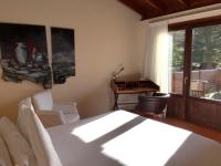 Postel nebo postele na pokoji v ubytování Hotel Masia La Palma