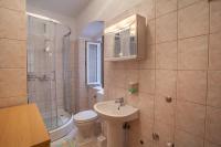 Koupelna v ubytování Apartments Dabović