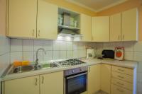 Kuchyň nebo kuchyňský kout v ubytování Apartments Dabović