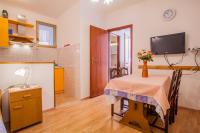 Kuchyň nebo kuchyňský kout v ubytování Apartments Dabović