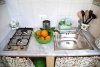Kuchyňa alebo kuchynka v ubytovaní Il Giardino di Laura Private Rooms Mondello