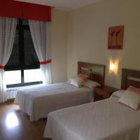 Postel nebo postele na pokoji v ubytování Hostal Santa Baia