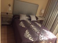 Postel nebo postele na pokoji v ubytování Hostal Santa Baia