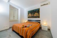A bed or beds in a room at Il Borgo