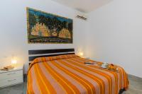 A bed or beds in a room at Il Borgo