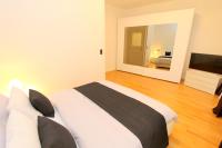 Postel nebo postele na pokoji v ubytování Luxury apartments Krocínova