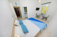 Posteľ alebo postele v izbe v ubytovaní Sea View Studio Apartment