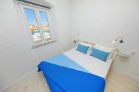 Posteľ alebo postele v izbe v ubytovaní Sea View Studio Apartment