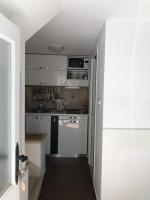 Kuchyňa alebo kuchynka v ubytovaní Elegant Apartment Leila
