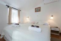 Posteľ alebo postele v izbe v ubytovaní Elegant Apartment Leila