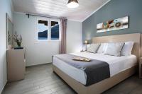 Posteľ alebo postele v izbe v ubytovaní Captain Nick Aparthotel