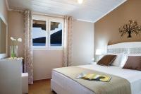Posteľ alebo postele v izbe v ubytovaní Captain Nick Aparthotel