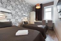 Postel nebo postele na pokoji v ubytování Hotel Traffic Poznań Stare Miasto