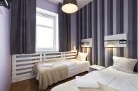 Postel nebo postele na pokoji v ubytování Hotel Traffic Poznań Stare Miasto
