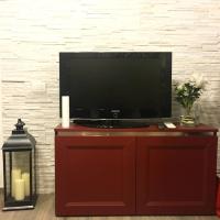 TV a/nebo společenská místnost v ubytování La Cascina