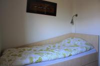 Una cama o camas en una habitaci&oacute;n de Apartments Livun Tuheljske Toplice