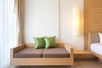 Postel nebo postele na pokoji v ubytování Ayrest Hua Hin Hotel