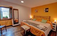 Posteľ alebo postele v izbe v ubytovaní Casa FamiliarArtola Etxea San Sebastian-Pamplona-Bilbao