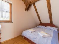 Posteľ alebo postele v izbe v ubytovaní Holiday home in Kvarner with outdoor jacuzzi
