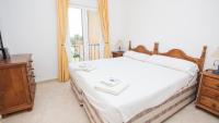 Posteľ alebo postele v izbe v ubytovaní Villas del Golf 23