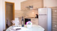 Kuchyň nebo kuchyňský kout v ubytování Apartmani J&P