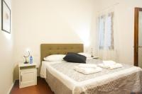 Posteľ alebo postele v izbe v ubytovaní Via Guelfa Apartment