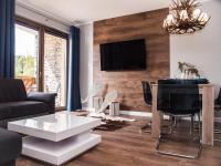 Telewizja i/lub zestaw kina domowego w obiekcie Apartamenty Bawaria