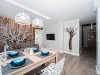 Telewizja i/lub zestaw kina domowego w obiekcie Apartamenty Bawaria