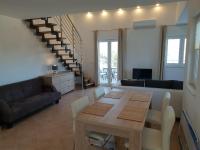 Posedenie v ubytovaní Apartments Villa Maslinica