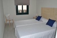 Posteľ alebo postele v izbe v ubytovaní Apartamento Trempat