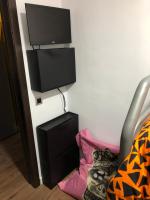 Televízia a/alebo spoločenská miestnosť v ubytovaní Apartamento Doña Pia