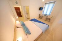 Posteľ alebo postele v izbe v ubytovaní Sea View Studio Apartment