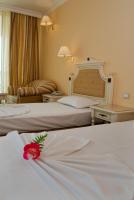 Postel nebo postele na pokoji v ubytování Duni Marina Beach Hotel - All Inclusive