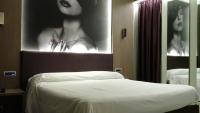 Posteľ alebo postele v izbe v ubytovaní Hotel Camelia