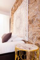 Postel nebo postele na pokoji v ubytování Ferreries Boutique Apartment