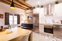 Kuchyň nebo kuchyňský kout v ubytování Ferreries Boutique Apartment