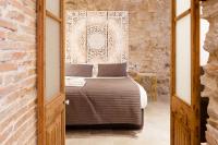 Postel nebo postele na pokoji v ubytování Ferreries Boutique Apartment