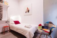Postel nebo postele na pokoji v ubytování Ferreries Boutique Apartment
