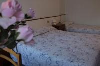 Posteľ alebo postele v izbe v ubytovaní Hotel Primavera