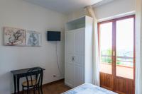 Televízia a/alebo spoločenská miestnosť v ubytovaní B&B Terramare