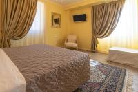 Posteľ alebo postele v izbe v ubytovaní Villa Luisa Rooms and Breakfast