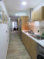 Kuchyňa alebo kuchynka v ubytovaní Living Sevilla Apartments Hércules