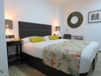 Posteľ alebo postele v izbe v ubytovaní Living Sevilla Apartments Hércules