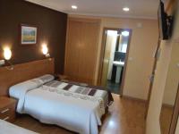 Hostal Lidoにあるベッド