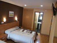 Hostal Lidoにあるベッド