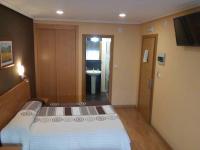 Hostal Lidoにあるベッド