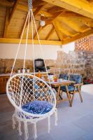 Televízia a/alebo spoločenská miestnosť v ubytovaní Vacation house Pietra