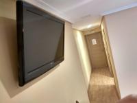 Hostal Lidoにあるテレビまたはエンターテインメントセンター