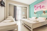 Posteľ alebo postele v izbe v ubytovaní Protopapas Rooms
