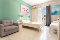Posteľ alebo postele v izbe v ubytovaní Protopapas Rooms